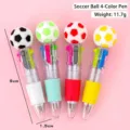 Retractable 4-color mini ballpoint pen with soccer ball topper in assorted colors - Soccer Style