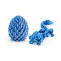 Detailed view of a 3D printed blue crystal dragon set with a textured dragon egg container. - Dragon Egg Set / Mech Blue