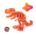 Detail view of a 3D printed T-Rex skeleton in metallic Laser Red finish with bonus bone. - T-Rex Skeleton (Laser Red) / 17cm