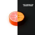 Luminous 3D printed fruit-shaped EDC fidget coin with orange citrus design for stress relief - Luminous Grapefruit