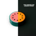 Watermelon 3D printed fidget coin featuring a vibrant luminous pink glow effect - Luminous Watermelon