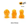 Macro view of 3D printed silk gold skull set in three classic see hear speak no evil poses - Mini / Three-Piece Set / Silk Gold