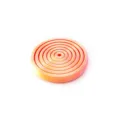 Close-up detail of 3D printed spiral decompression toy disc in dreamy orange gradient - Dreamy Orange