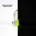 Macro view of 3D printed luminous ghost in a bottle keychain showing glow effect - Luminous Yellow