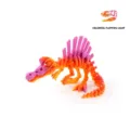 Detail view of 3D printed articulated spinosaurus skeleton toy in rainbow gradient colors - Mini / Colorful Streamer