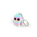 Close-up of a 3D printed rainbow owl keychain accessory with cute large black eyes - Owl With Feet / Rainbow Style 2