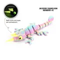 3D printed articulated Jackson Chameleon toy in rainbow colors with glow-in-the-dark features. - Mini / Rainbow 2
