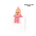 Cute pink 3D printed banana man figurine sitting on white cube, creative desktop gift - Banana Man / Spring Collection