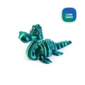 Vista dettagliata di un mostro di Loch Ness verde laser stampato in 3D con giunti articolati - Verde laser / Mini
