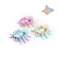 Detail of 3D printed texture on articulated rainbow multi-eyed spider desktop ornaments. - Rainbow 2