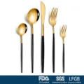 Detail of luxury Portuguese style golden stainless steel cutlery set with black handles - Five-Piece Set / Black & Gold