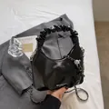 Stylish black glossy cloud bag for women featuring a pleated handle and silver chain strap - No Pendant / Black