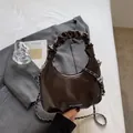 Elegant dark brown glossy pleated cloud bag featuring a scrunchie handle and chain strap - No Pendant / Coffee