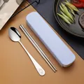 Portable stainless steel cutlery set with smiley face spoon and light blue storage case - Two-Piece Set / Blue