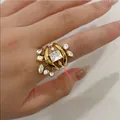 Gold-plated stainless steel wavy open ring featuring sparkling zircon dangle charms - Multi-layer Tassel Wave Open Ring (JDR0307045-7) / Gold