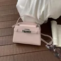 Trendy pink crocodile pattern crossbody bag with silver hardware in Kelly style. - No Pendant / Pink