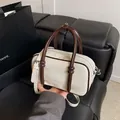 Elegant cream white mini Boston bag with brown handles and a slim adjustable strap. - 白配咖标准款 / White & Coffee