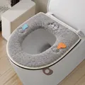 Thickened grey plush toilet seat cover featuring a cute cartoon cat face and zipper - Seal Cutlery / Gray