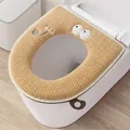 Soft brown plush toilet seat cover featuring cartoon eyes design and zipper closure - Blue Eye with Lashes / Coffee