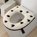 Soft plush white toilet seat cover featuring black bird patterns and a portable handle - Houndstooth / Black