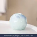 Decorative light blue ceramic vase with crystalline glaze and floral patterns for tabletop - Blue Floral Sphere / Diameter 9.5cm x Height 8.5cm x Caliber 2.8cm