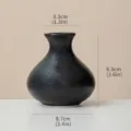 Modern minimalist black textured ceramic flower vase for home decor and desktop arrangement - Black