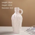 Vase en céramique blanc crème minimaliste avec texture ondulée et poignée latérale - L / Blanc Tacheté
