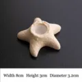 Beige starfish shaped ceramic candle holder base with textured finish for table decor - Starfish Style / Spot Yellow
