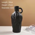 Vase en céramique noir mat nordique minimaliste avec texture ondulée irrégulière - L / Noir