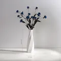 Minimalist white twisted ceramic vase for home decor, 25.8cm height and 8.3cm base - Spiral Twist Geometric Style