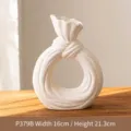 Modern white circular ceramic vase with knot design for elegant home decor, 16x21.3cm - New Knotted Donut Medium / Height 21.2cm, Width 16cm