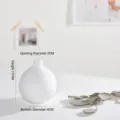 Jarrón de cerámica blanca texturizada elegante de estilo nórdico minimalista hogar - Estilo de Puntos en Relieve