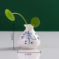 Mini jarrón de cerámica con motivo de loto azul, altura de 4,8 cm para decorar la mesa - Patrón de Pez Azul Único (Estilo 4)