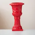 Vintage red ceramic vase featuring ornate Roman column relief carving for elegant decor - Medium - Red