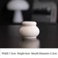 Minimalist white ribbed ceramic candle holder for table decor, variant size 7.5cm width - Lamp Ring Style / Spotted White