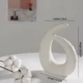 Modern Nordic white ceramic vase with abstract circular shape and textured finish for home decor - Style 6 (FY0321) / White