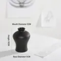 Modern minimalist black textured ceramic vase for home decor, 10cm height, matte finish. - Caliber 3cmxHeight 10cmxBase 5cm / Black