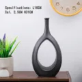 Elegant modern minimalist black ceramic vase for dried flowers and home living room decor - Hollow Oval Style (WD325) / Large (31x16x2.5cm) / Matte Black