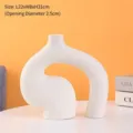 Modern minimalist white ceramic vase with abstract curved shape and granite speckle finish - Baoyue Style / L / Off White