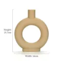 Moderne Scandinavische beige keramische donut vaas met matte textuur, hoogte 19,7 cm - M / Crèmegeel