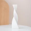 Modern white ceramic twisted vase for minimalist home decor and floral arrangements. - Torsional Geometry / L / White