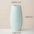Elegante vaso in ceramica azzurro con finitura lucida per la decorazione della casa - Bocca Curva Grande (Blu Chiaro) / Calibro 7.0cm Altezza 24.0cm Lunghezza 11.9cm