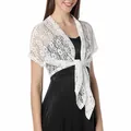 Detailed view of elegant white floral lace bolero shrug tied over a black dress - Tops / White