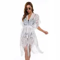 Witte kanten strandhoes met trekkoord in de taille en details van franje kwastjes - Eén maat / Robe / Wit