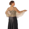 Close-up of elegant golden sequin shawl wrap for evening party and banquet dresses. - Gold