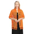 Detail showing vibrant orange embroidered lace shawl with delicate floral patterns. - Orange