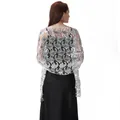 Back view of elegant silver paisley sequin lace shawl draped over a black dress - White