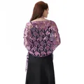Detail view of elegant purple sequined paisley lace shawl over a black evening dress back - Light Purple