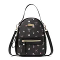 Fashionable black mini crossbody backpack featuring pink floral and bow print with gold accents - Black