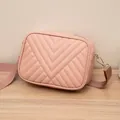 Stylish pink quilted camera bag for women with V-shaped stitching and gold hardware - Pink